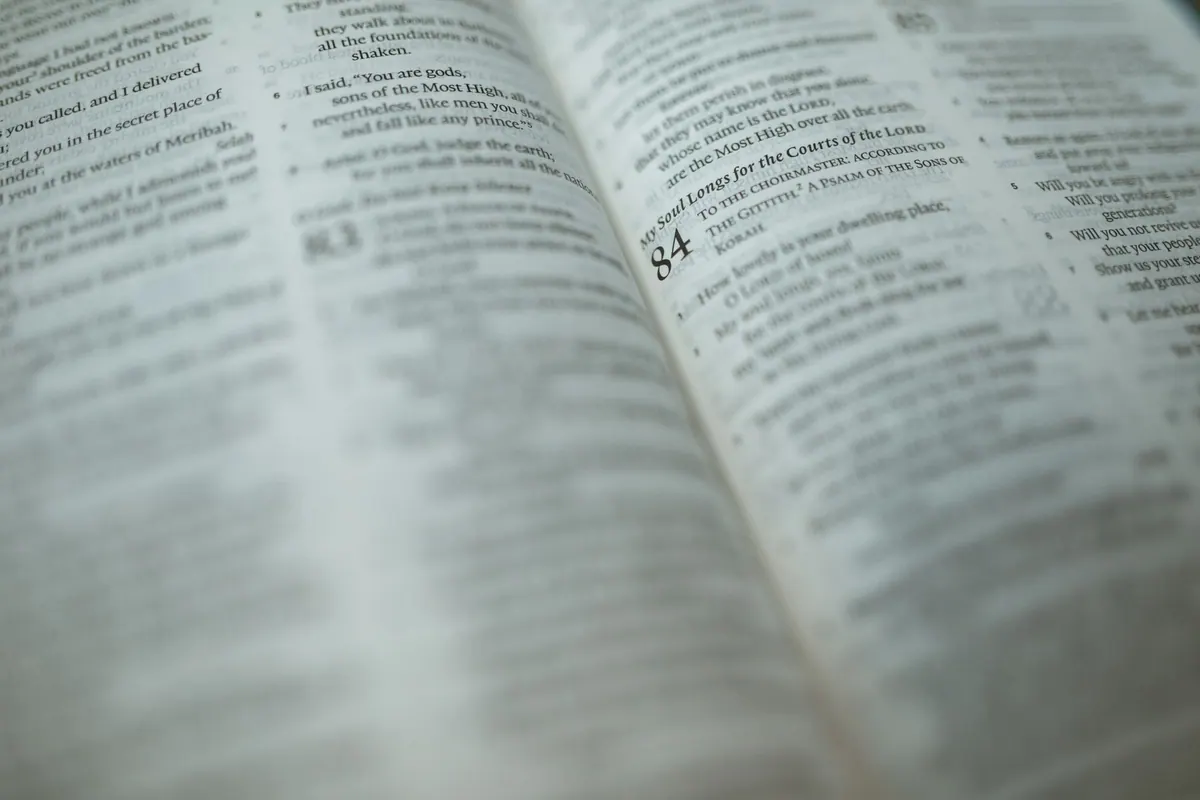Close-up of an open Bible page with Psalm text