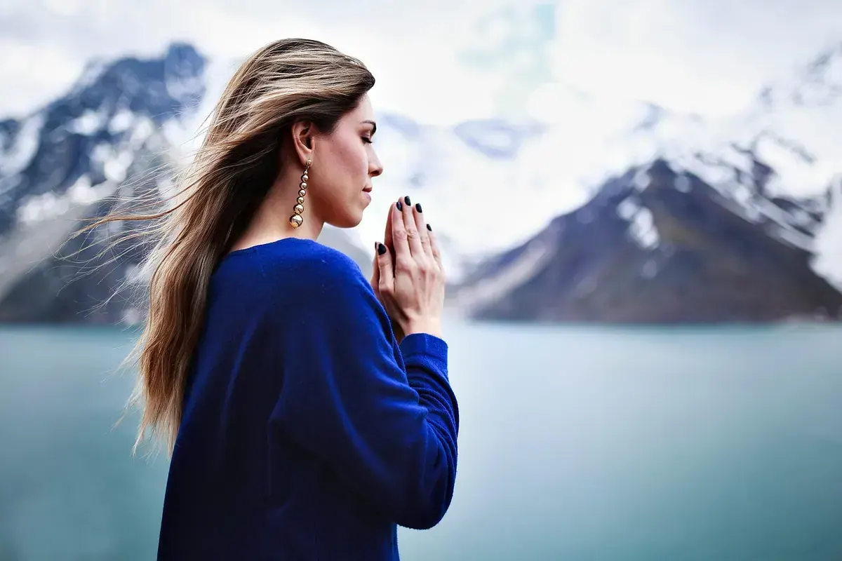 Woman waiting quietly in reflection while trusting God for healing