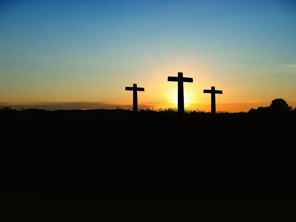 Cross and open Bible illustrating hope, mercy, and the promise of restoration through Christ