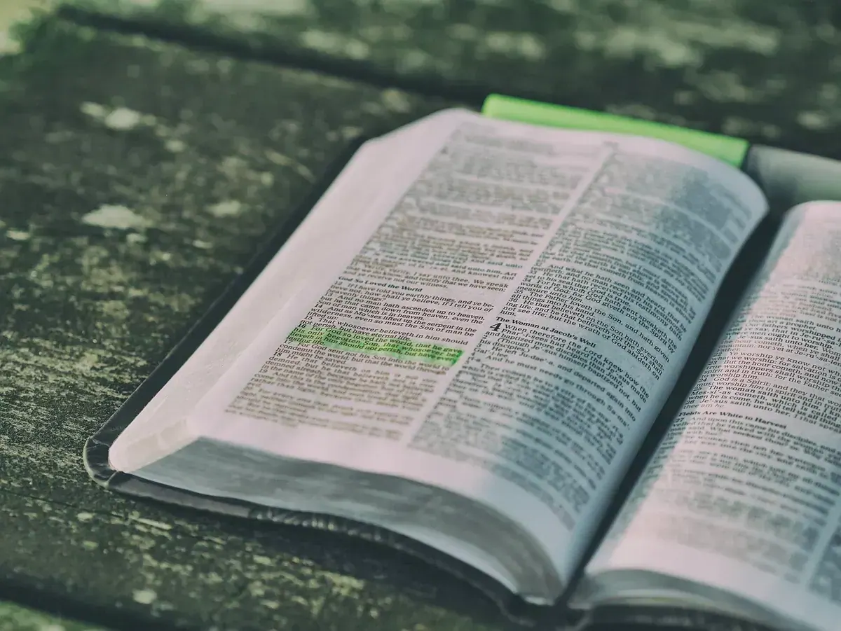 Open Bible and cross image representing God''s promise to restore what is broken