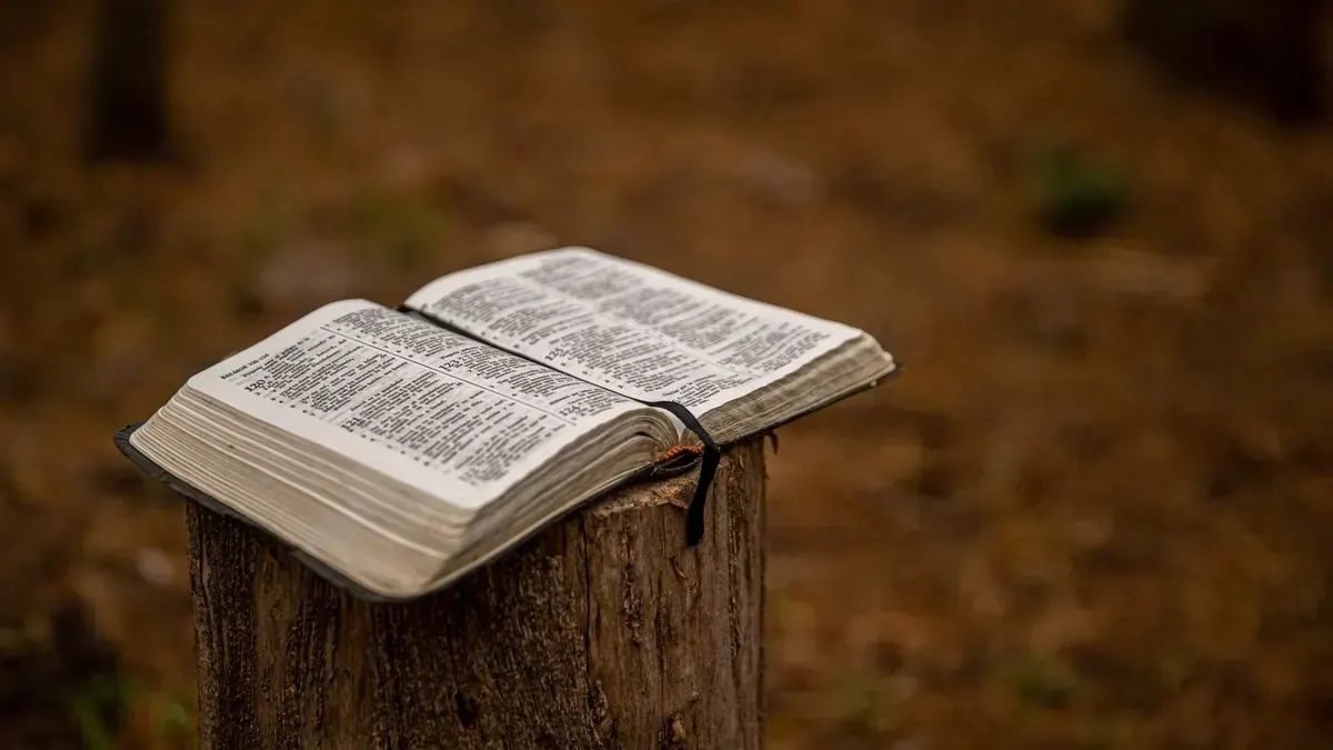 Person in quiet prayerful reflection, symbolizing the renewal and healing of restoration in the Bible
